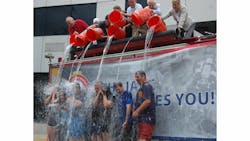 IAFC department directors and executive staff, including Mark Light, IAFC&apos;s CEO and executive director, accepted the Ice Bucket challenge and collected donations from the IAFC staff, who bid their own money for a chance to dump ice water on their bosses.