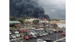 A blaze at a Lima warehouse sends black smoke downtown. A blaze at a Lima warehouse sends black smoke downtown.