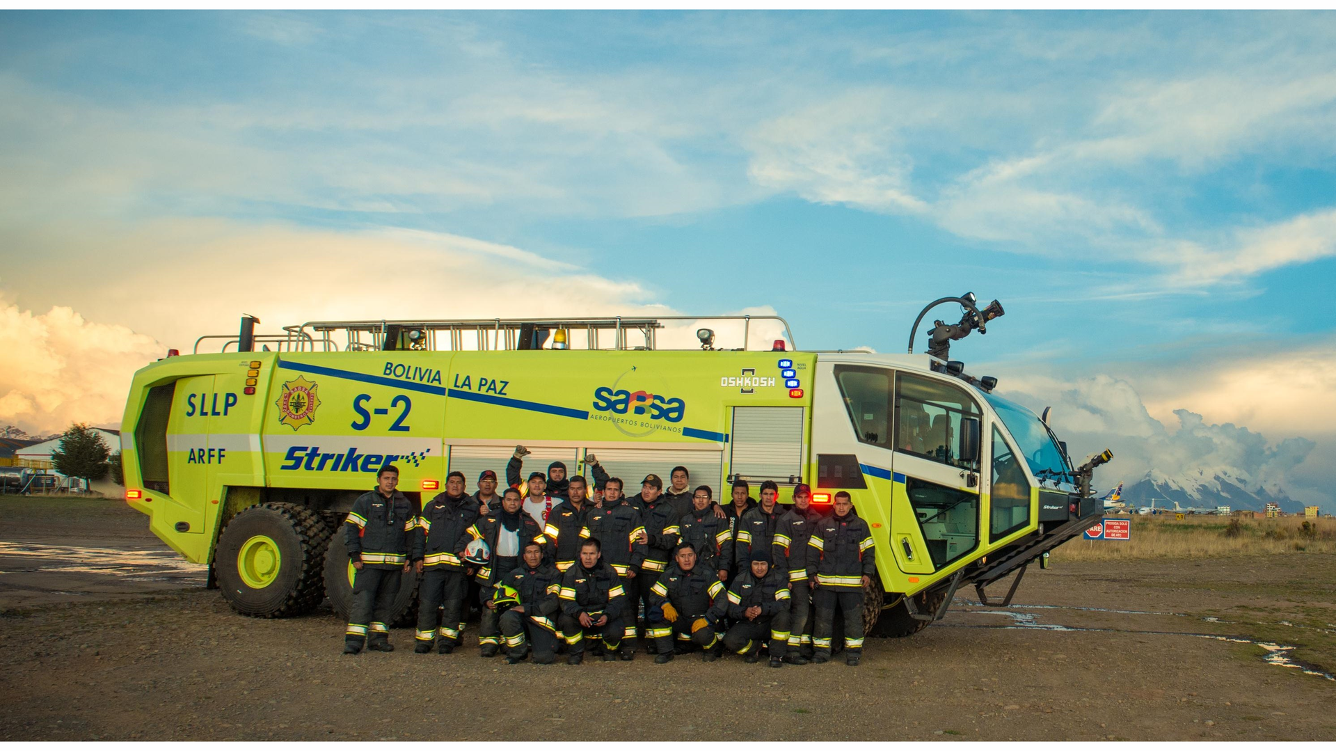 Oshkosh delivered three new Striker 6 X 6 ARFFs to airports in Bolivia. Pictured here is the ARFF team at El Alto International alongside their new Striker. At 4,061 meters (13,325 feet) it is the highest elevation international airport in the world.