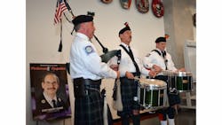 The FDNY Emerald Society Pipe and Drum band performed Saturday.
