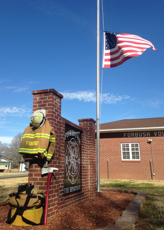 A memorial for Forbush's chief was placed in front of the station after the passing of Chief Ricky Doub.