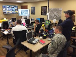 Members of the Unified Command in Clayton monitor as the announcement takes place. Members of the Unified Command in Clayton monitor as the announcement takes place.