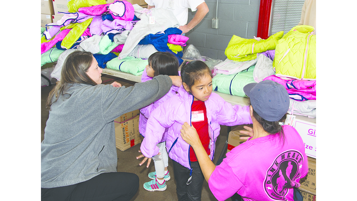 FXFRD distributed new winter coats and sneakers to area children.