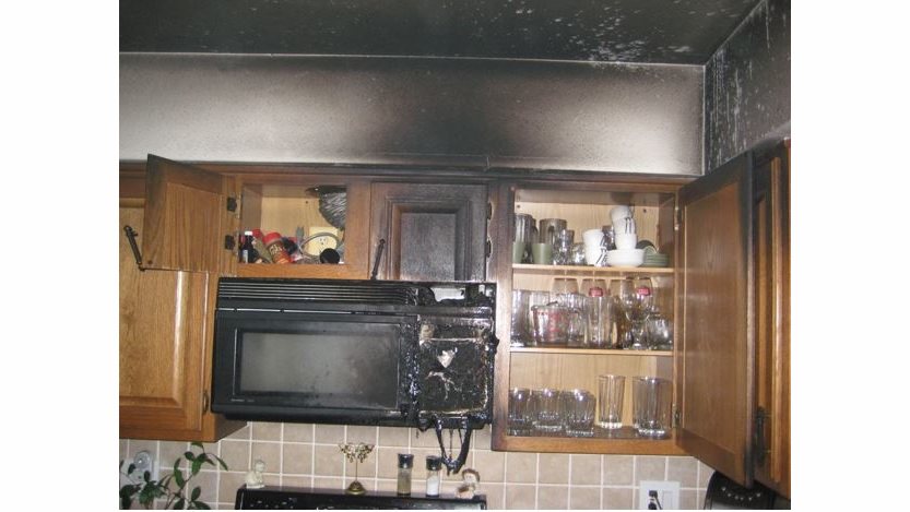Photo 5: The soffit area above the kitchen and bathroom cabinets is a common area for fire to spread unchecked. Crews need to open that area to assure the fire has not traveled.