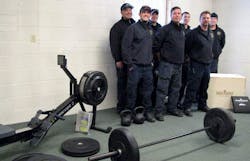 Firefighters from the Upper Pine River Fire Protection District in Colorado with the equipment from the &apos;Strength is Our Foundation&apos; grant. It included a rowing machine, squat stand, workout bench and kettlebells.