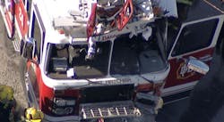 The ladder truck was en route to a fire when it collided with a cement truck. The ladder truck was en route to a fire when it collided with a cement truck.