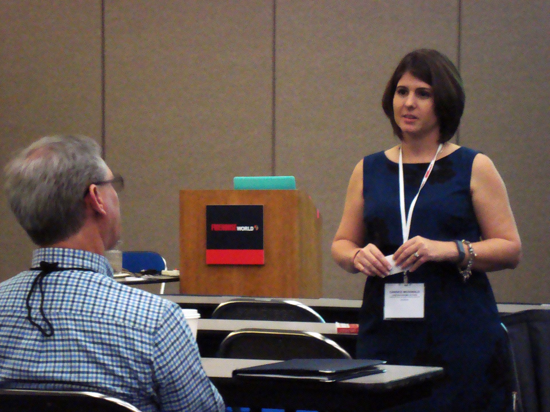 Candice McDonald, MA FF/EMT with Cumberland Valley Volunteer Fireman&rsquo;s Association, speaks with a Firehouse World attendee during a class she presented on protecting fire departments' reputations in the age of social media.
