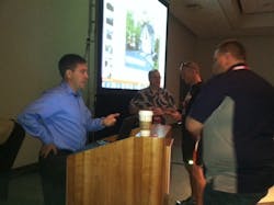 Humboldt Bay, Calif. Battalion Chief Chris Jelinek talks with a firefighter after his session. Humboldt Bay, Calif. Battalion Chief Chris Jelinek talks with a firefighter after his session.