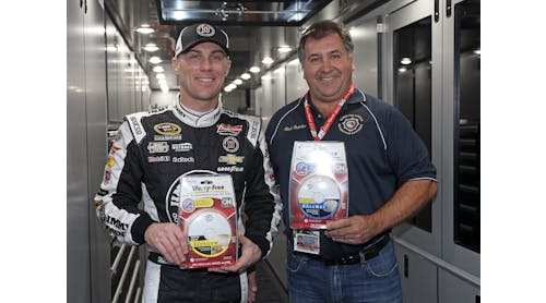Kevin Harvick (left) makes donation of 250 Kidde smoke alarms to Rick Butcher, president of the Florida Fire Marshals and Inspectors Association.