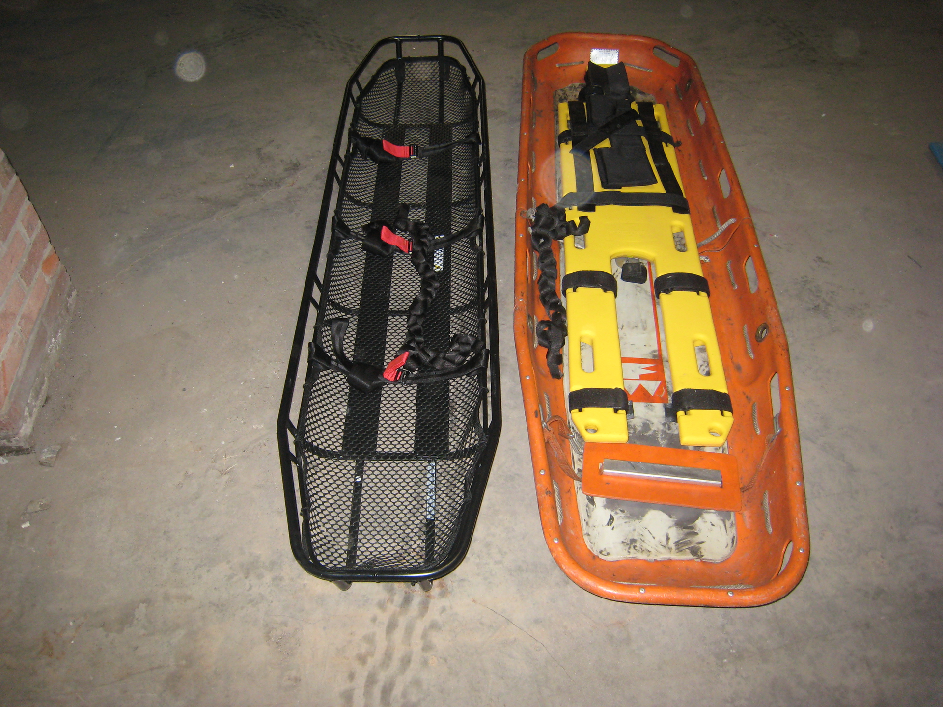 What is available in your cache to remove a victim? In this case, the litter on the left is a confined-space litter; it is only 17 inches wide at the widest point. This is the preferred litter for manipulating through tight entry portals.