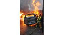 DEC. 1, 2014: SAN FERNANDO VALLEY, CA &ndash; A fire that began in a storage yard burned through dozens of cars and trash and slowed freeway traffic during rush hour. Task Force 98 attacks one part of the blaze.