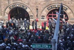 Memorial plaques were dedicated to Lt. Edward Walsh and Firefighter Michael Kennedy, who died in the March 26, 2014 fire in Boston.