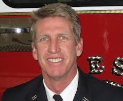 Fresno Fire Capt. Peter Dern suffered serious burns after falling through the roof at a garage fire.