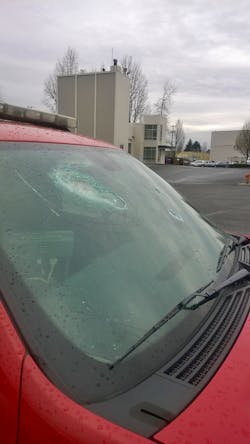 This fire department vehicle was damaged by rocks. This fire department vehicle was damaged by rocks.