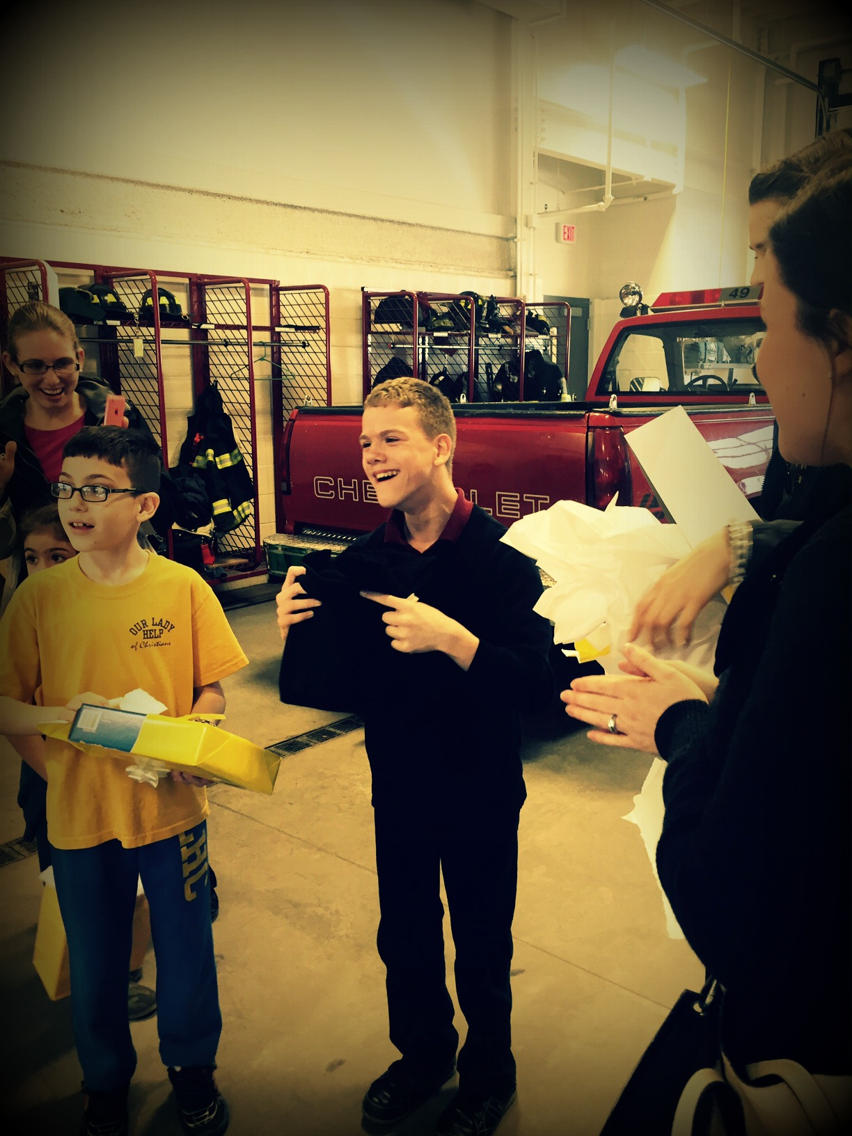 Michael, right, is a young fan of Plymovent exhaust removal systems and the company recently acknowledged him as a fan.