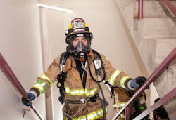 A member of Oregon&rsquo;s Sunriver Fire &amp; Rescue team makes his way up the Tower&rsquo;s 69 floors.