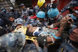 A teen trapped in rubble for five days is removed by U.S. search and rescue task force crews and officers.