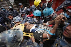 A teen trapped in rubble for five days is removed by U.S. search and rescue task force crews and officers. A teen trapped in rubble for five days is removed by U.S. search and rescue task force crews and officers.