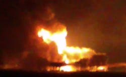 This frame grab of a video from the news station Noticias Ciudad del Carmen shows a fire burning at an oil platform in the Gulf of Mexico along the Mexican coast before sunrise on Wednesday, April 1, 2015. The fire broke out overnight at the Abkatun Permanente platform, located in the Campeche Sound, near the coast of the Mexican states of Campeche and Tabasco.