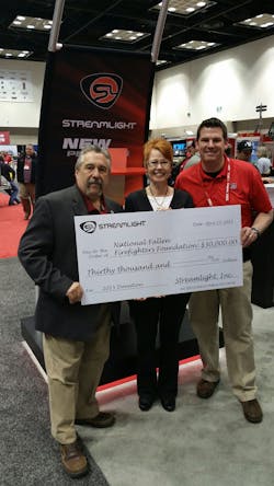 Geoff Evans, Streamlight Industrial Division National Fire Service Specialist presenting check to Cathy Hedrick and Chief Ronald Siarnicki of NFFF. Geoff Evans, Streamlight Industrial Division National Fire Service Specialist presenting check to Cathy Hedrick and Chief Ronald Siarnicki of NFFF.