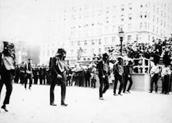 Members of Rescue Company 1 wearing smoke helmets during the FDNY 50th Anniversary parade and Medal Day presentation, June 12, 1915. Members of Rescue Company 1 wearing smoke helmets during the FDNY 50th Anniversary parade and Medal Day presentation, June 12, 1915.