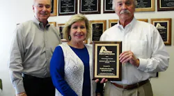 The award recipients from Southeastern Laundry Equipment Sales, are from left to right: Joe Cole, sales manager; Cindy Richie, vice president/general manager; and Trebor Brown, president.
