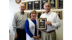 The award recipients from Southeastern Laundry Equipment Sales, are from left to right: Joe Cole, sales manager; Cindy Richie, vice president/general manager; and Trebor Brown, president.