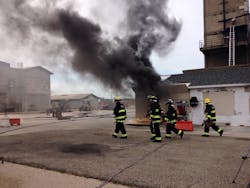 The initial burn starts to consume the contents of the burn structure.