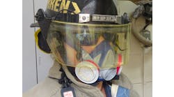 University of Extrication research work involving cutting carbon fiber material required personnel to take serious respiratory precautions. Pictured here is our tool operator showing his level of respiratory protection due to the airborne hazard from the carbon fiber material.