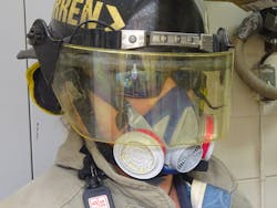 University of Extrication research work involving cutting carbon fiber material required personnel to take serious respiratory precautions. Pictured here is our tool operator showing his level of respiratory protection due to the airborne hazard from the carbon fiber material.