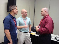 Lt. John Dixon, right, speaks with attendees of his class on the normalization of deviance at Firehouse Expo.
