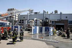 An overall view of the exposure 3 side of the fire building. An overall view of the exposure 3 side of the fire building.
