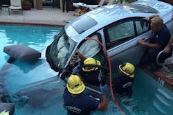 Ventura County firefighters work to extricate the driver from the vehicle that ended up in the pool. Ventura County firefighters work to extricate the driver from the vehicle that ended up in the pool.
