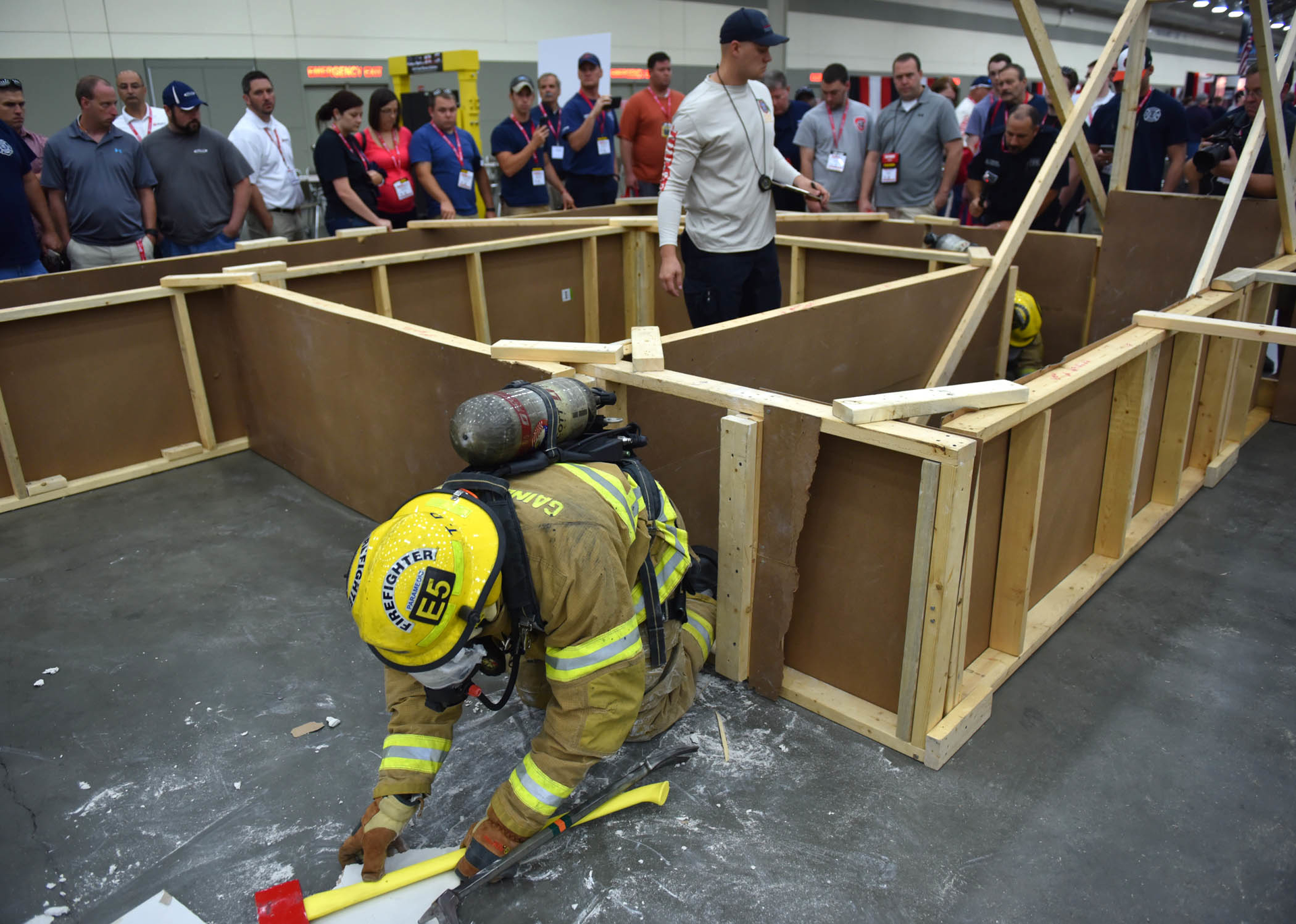 A member of the Gainesville, Fla., Fire Department moves through the Fire-Rescue Competition course.