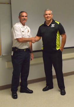 Albuquerque Fire Chief David Downey with VIKING Western US Sales Manager Grant Grinstead Albuquerque Fire Chief David Downey with VIKING Western US Sales Manager Grant Grinstead