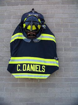 Chris Daniels&apos; gear hangs outside of Smithfield Fire Department.