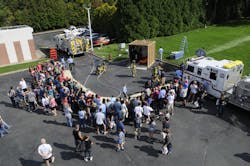 As part of the Hauppauge, NY, Fire Department’s annual fire safety and prevent event, firefighters prepare to start a room and contents fire to demonstrate the effectiveness of home fire suppression systems. As part of the Hauppauge, NY, Fire Department’s annual fire safety and prevent event, firefighters prepare to start a room and contents fire to demonstrate the effectiveness of home fire suppression systems.