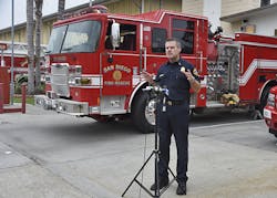 San Diego Fire-Rescue Assistant Chief Brian Fennessy briefs the media on the first-ever national deployment of the San Diego Urban Area Incident Management Team.