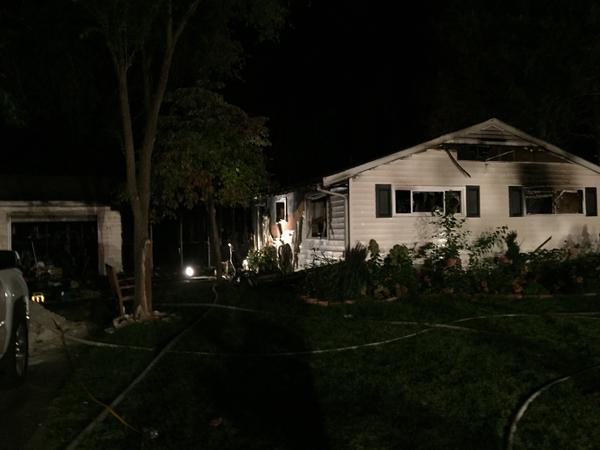 Heavy fire was showing from this house.