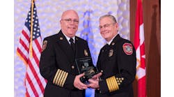 James E. White, CFO, left, was honored by receiving the Ronny Jack Coleman Leadership Legacy Award during the Center for Public Safety Excellence&rsquo;s 16th annual awards ceremony held during Fire-Rescue International in Atlanta. Randy Bruegman, CFO, FIFireE, CPSE President, Fire Chief, Anaheim Fire Department, right, presented the award.