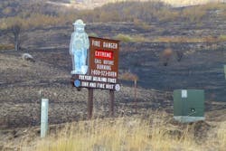 Smokey stands in a scorched Wash. field. Smokey stands in a scorched Wash. field.