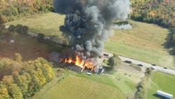 Flames fanned by high winds destroyed four structures. Flames fanned by high winds destroyed four structures.