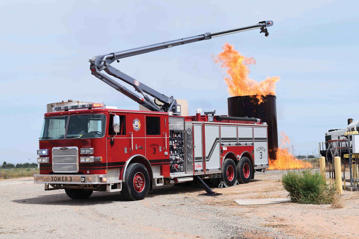 This Pierce Arrow XT pumper outfitted with an Oshkosh-exclusive Snozzle High Reach Extendable Turret (HRET) is serving with the Malaga Fire Department in Eddy County New Mexico. Since going into service, the apparatus has proven itself in several emergency responses, even putting out four different oil storage facility fires in a single day.