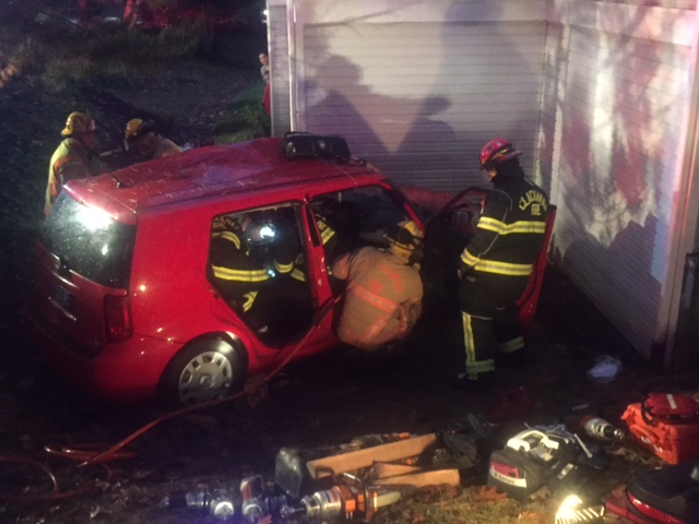 Firefighter Extrication Car Crashes Into Bldg 1 5628f246494a7