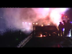 Car Fire Battled on Interstate