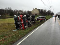 Firefighters aboard this engine are OK. Firefighters aboard this engine are OK.
