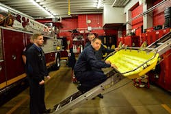 Prince George's County Firefighter Miguel Ocasio Jr., on ladder, explains the rescue effort. Prince George's County Firefighter Miguel Ocasio Jr., on ladder, explains the rescue effort.