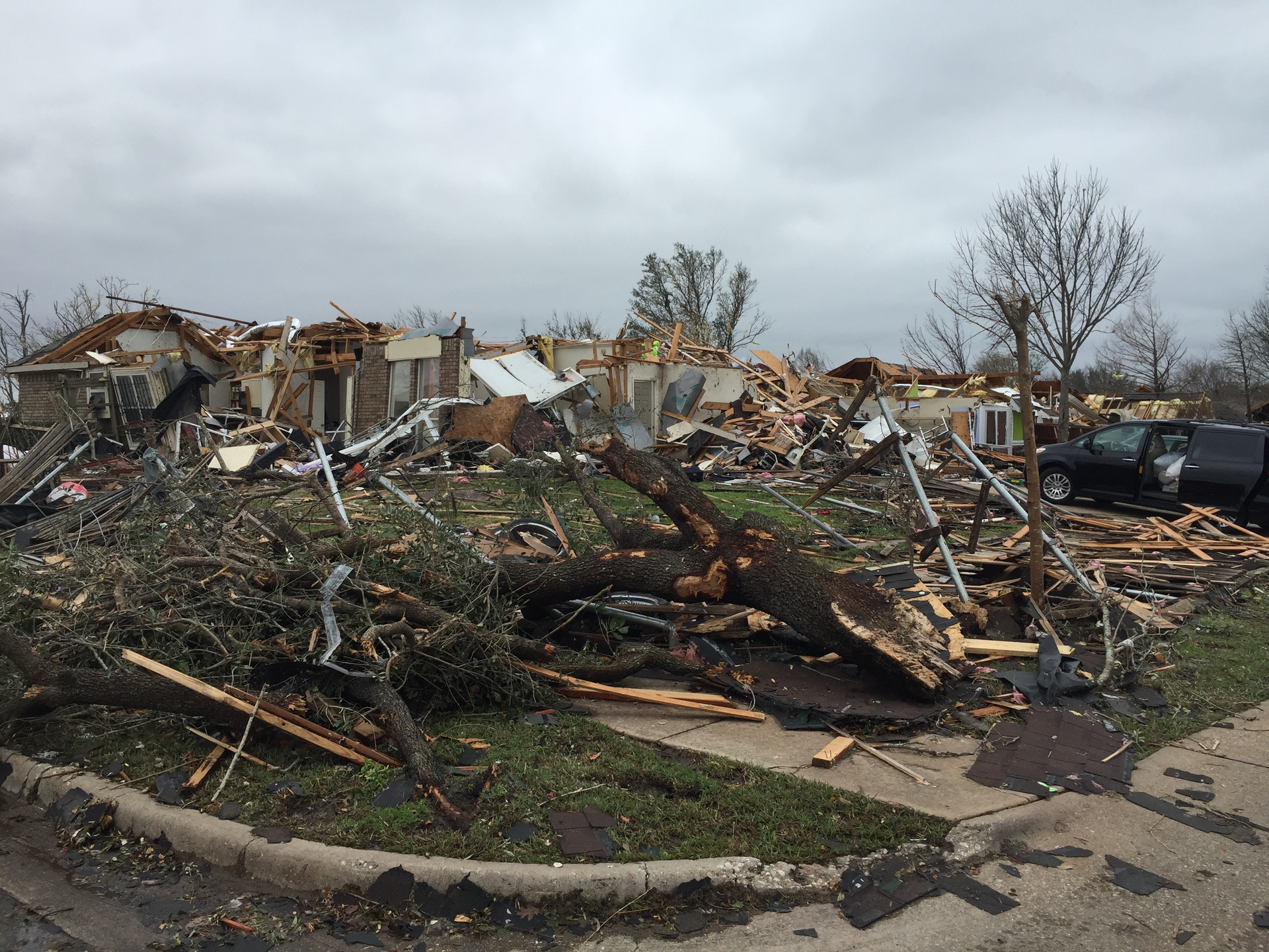 Firefighters responding to reports of collapsed homes found block after block devastated.
