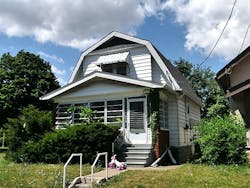 A view of the home to which Dorner and his crew were dispatched—a one-and-a-half-story, early 1900s house. Upon their arrival, there was light smoke drifting from the eaves. A view of the home to which Dorner and his crew were dispatched—a one-and-a-half-story, early 1900s house. Upon their arrival, there was light smoke drifting from the eaves.
