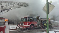 Chicago firefighters battled an auto shop fire Tuesday morning. Chicago firefighters battled an auto shop fire Tuesday morning.